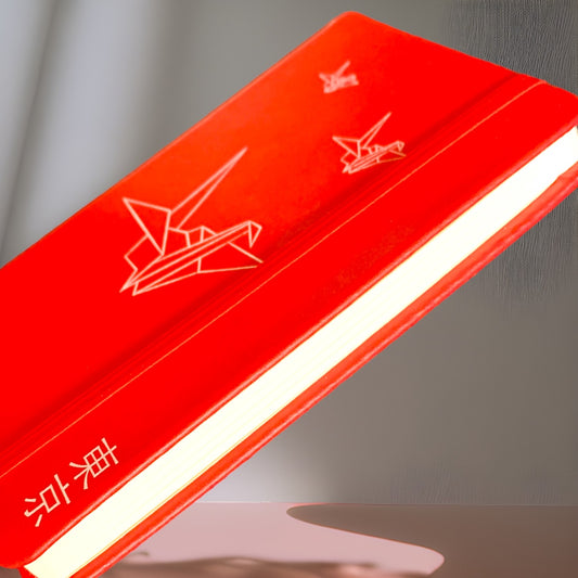 Libreta "Origami" roja y negra pequeña.