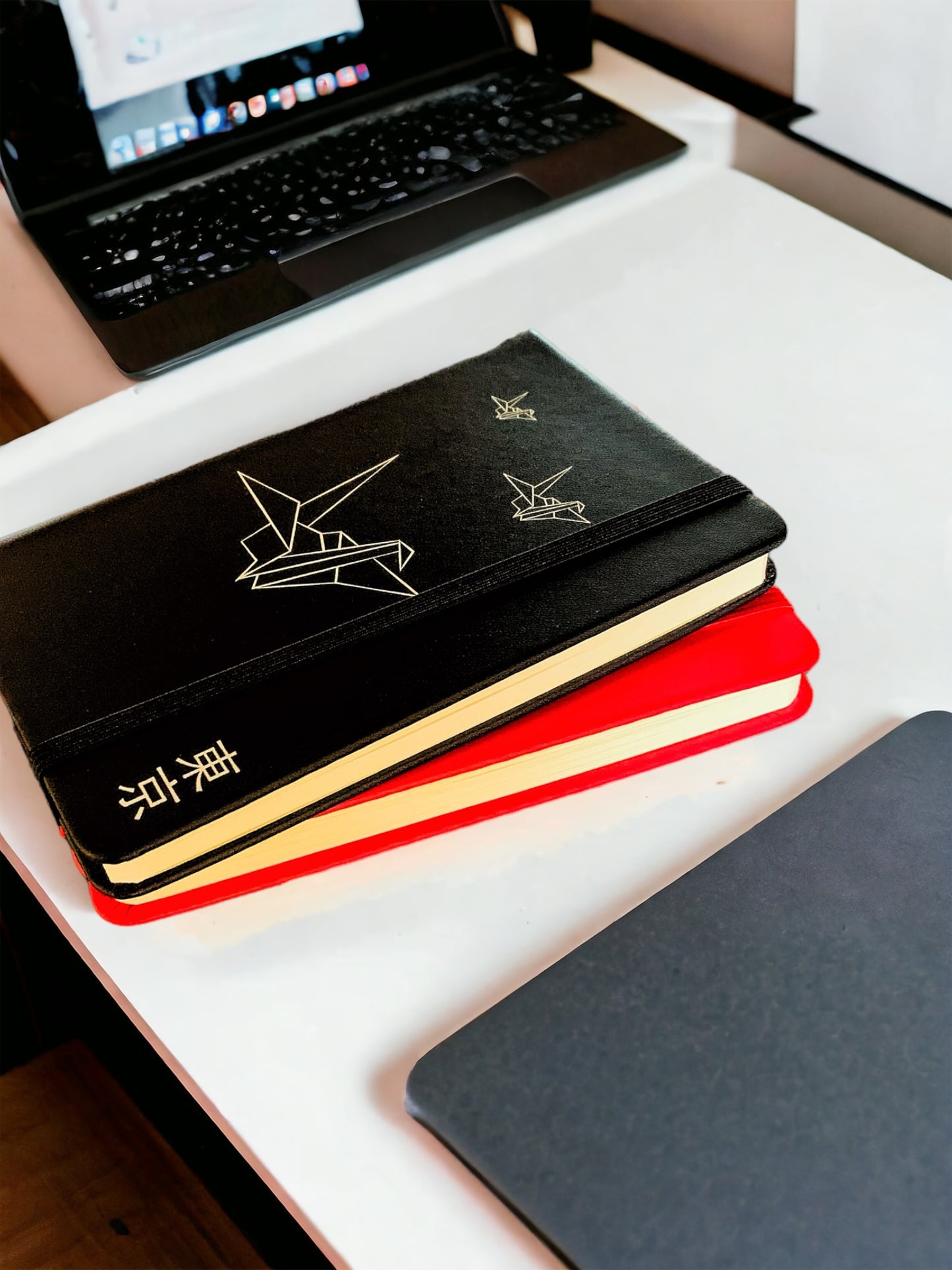 Libreta "Origami" roja y negra  pequeña.